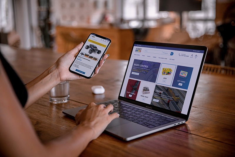 Laptop and mobile device showing the responsive ecommerce website for Hobby Wholesale